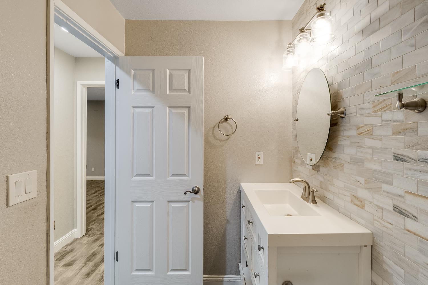 2623 Copa Del Oro Drive Union City, CA 94587 - Photo 35 of 55 a bathroom with a sink a mirror and shower