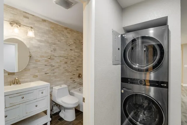 a view of hallway with wooden floor