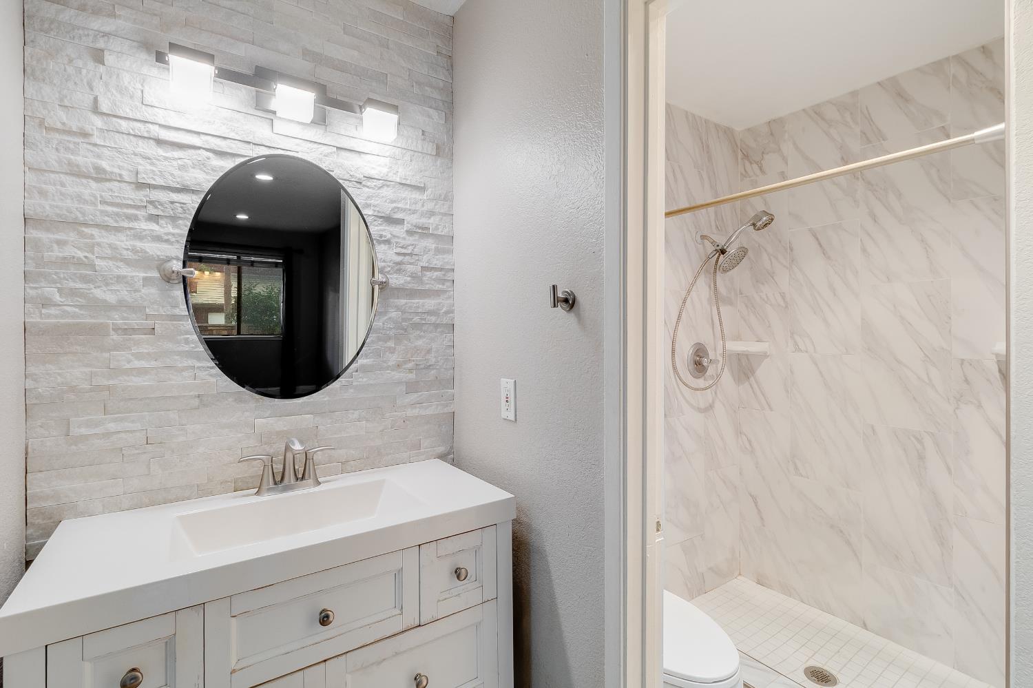 2623 Copa Del Oro Drive Union City, CA 94587 - Photo 43 of 55 a bathroom with a sink a toilet and shower