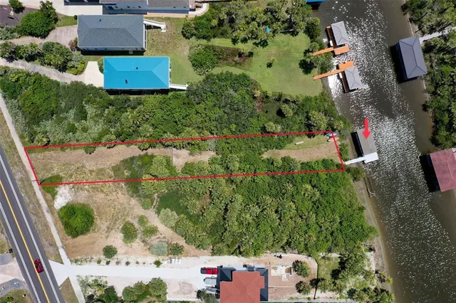 an aerial view of residential house with outdoor space