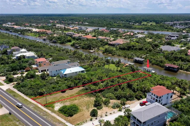 an aerial view of residential house and outdoor space