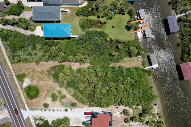 an aerial view of residential house with outdoor space