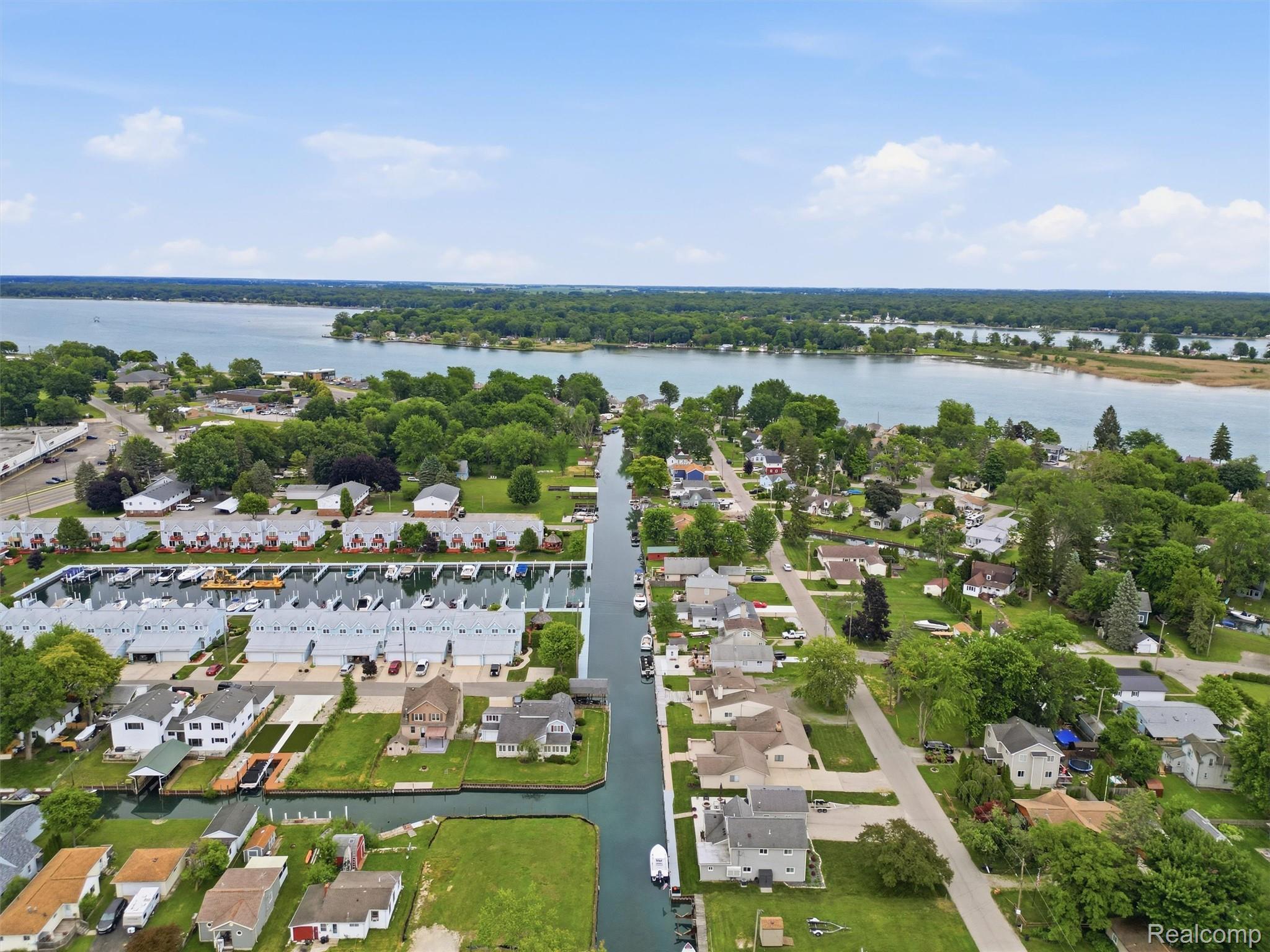 117 Kenyon Road Algonac, MI 48001 - Photo 8 of 47 Aerial perspective showcasing a waterfront community with canal access
