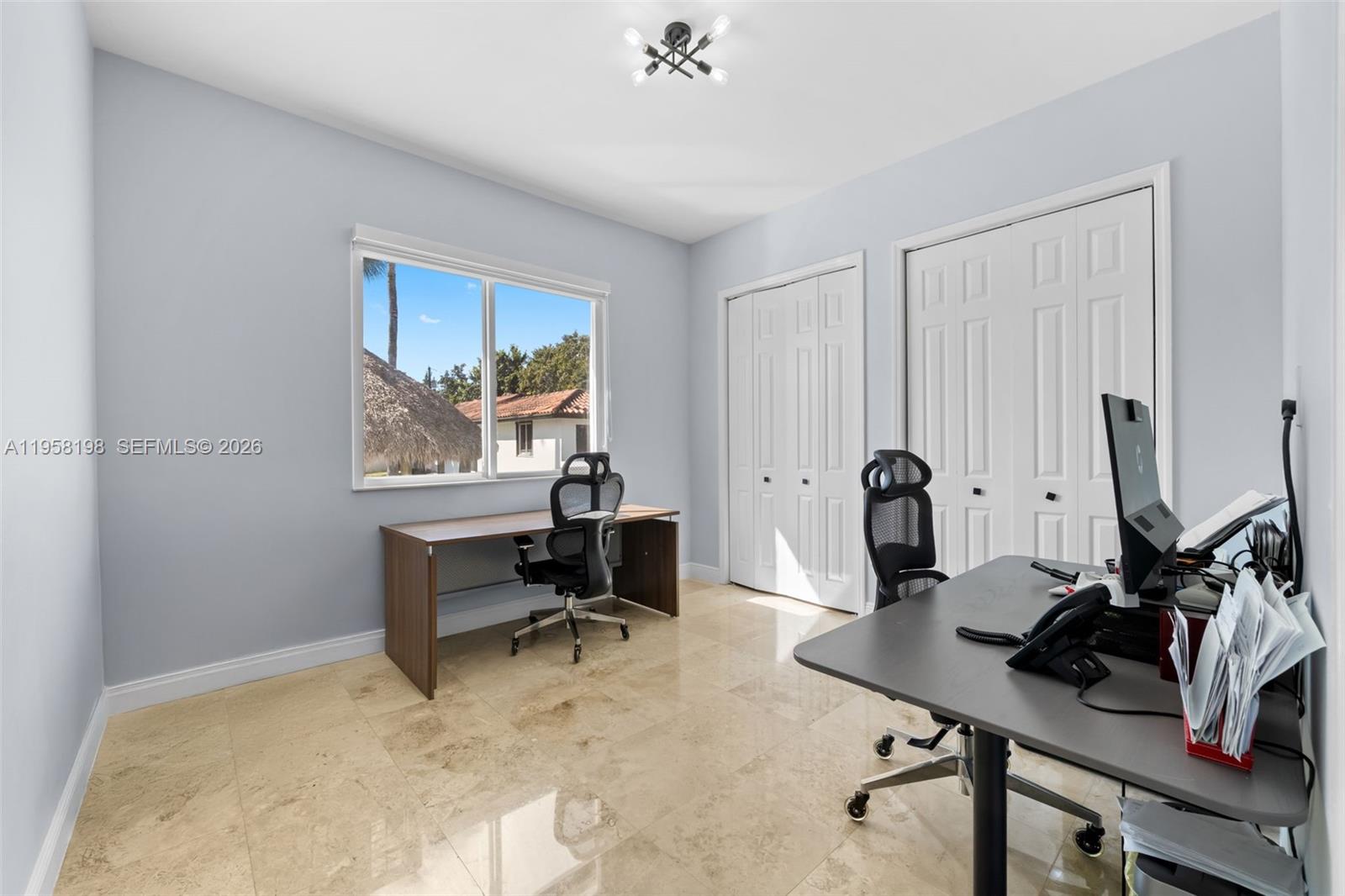 16800 Southwest 190th Street Miami, FL 33187 - Photo 29 of 56 a view of a workspace with furniture