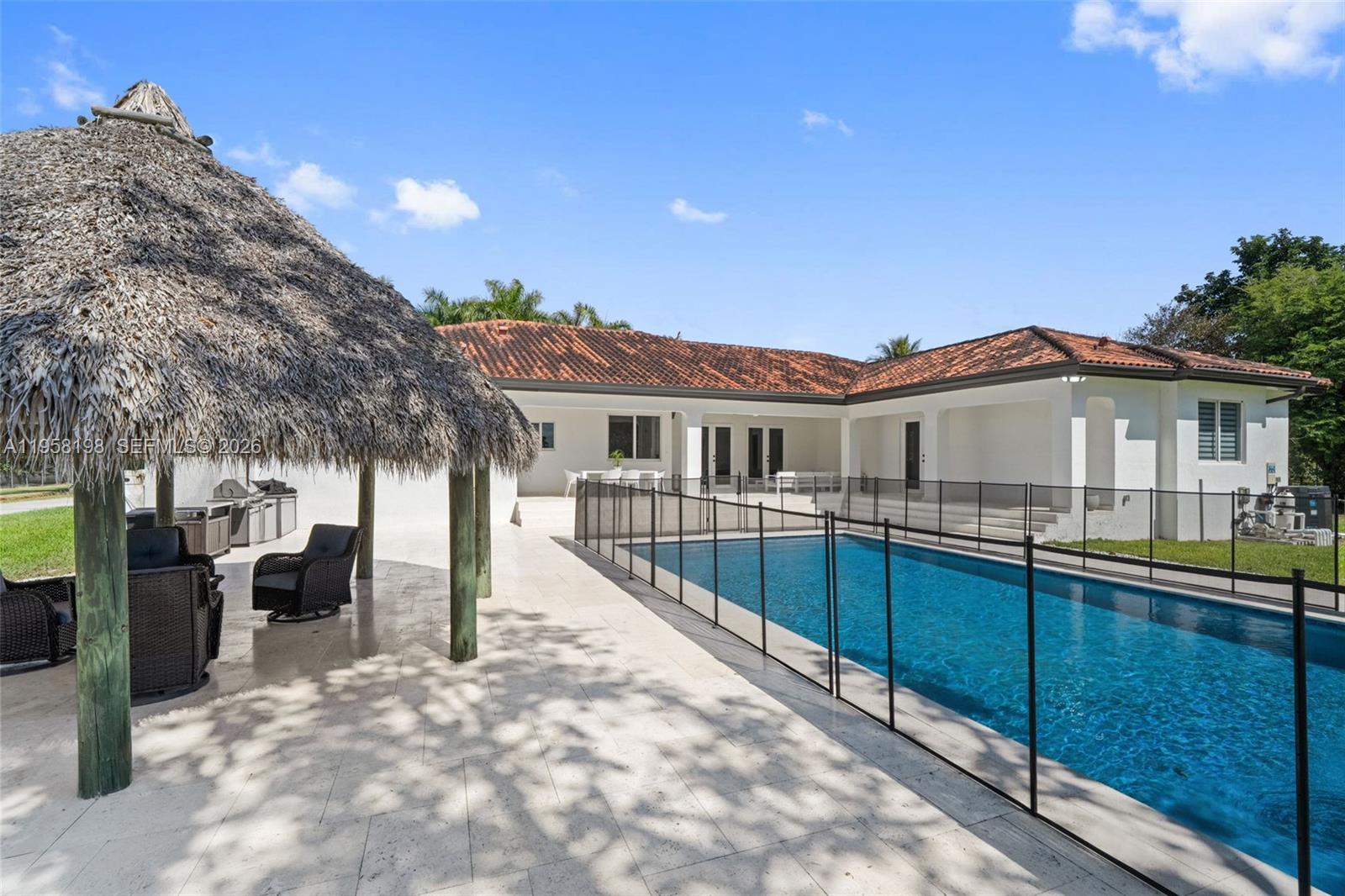 16800 Southwest 190th Street Miami, FL 33187 - Photo 36 of 56 a view of a house with a roof deck