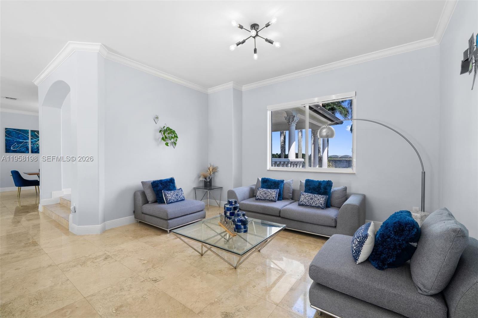16800 Southwest 190th Street Miami, FL 33187 - Photo 10 of 56 a living room with furniture and a wooden floor