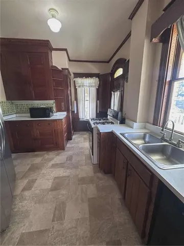 a large bathroom with a sink and a large mirror