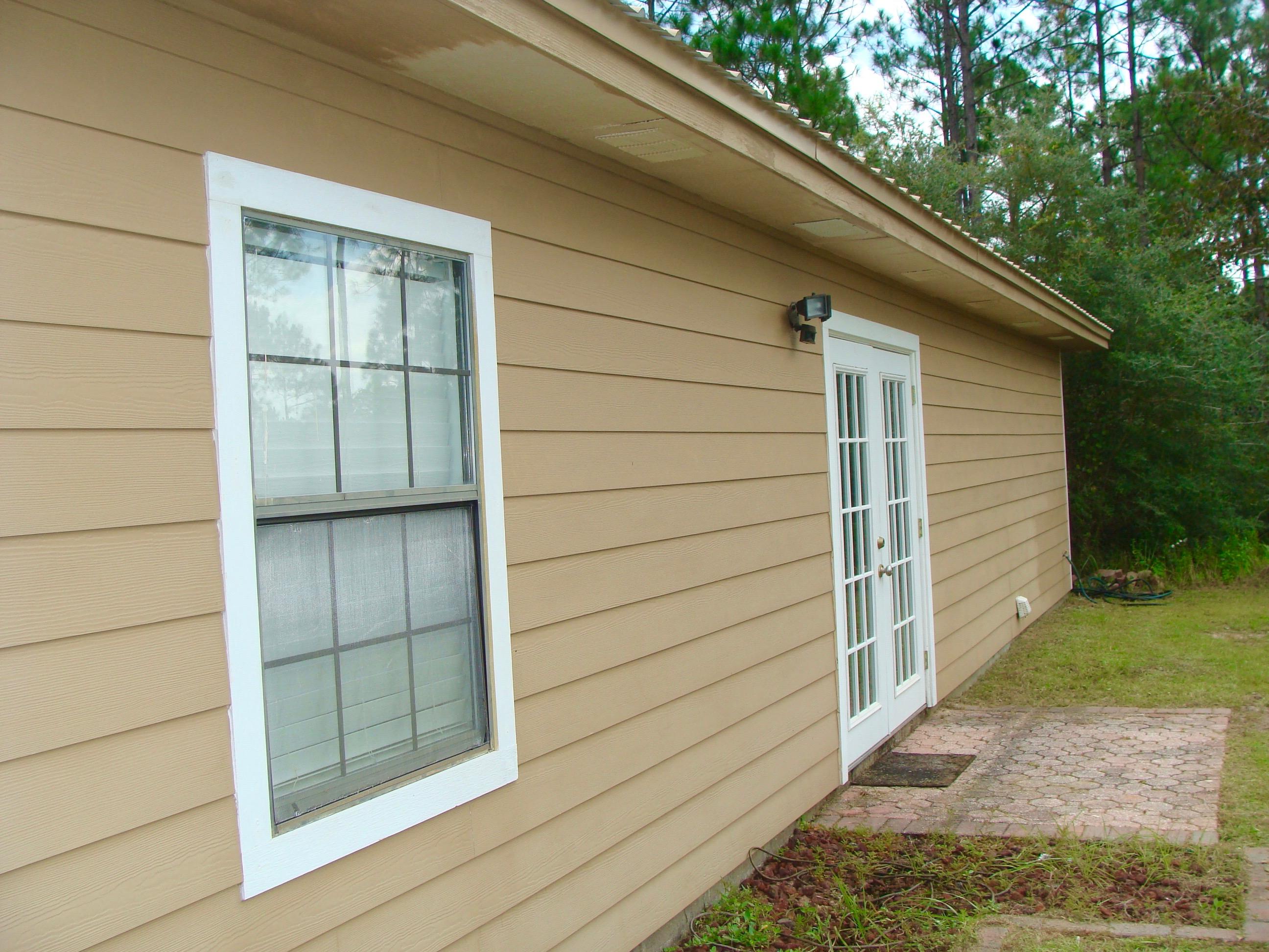 1122 Rock Hill Road DeFuniak Springs, FL 32435 - Photo 10 of 43 New Cement Board Siding!