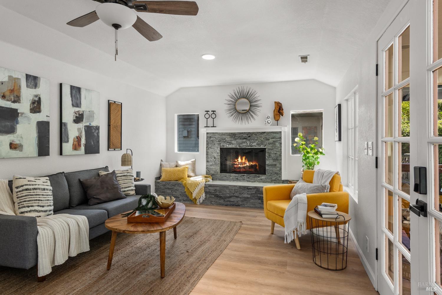 15627 Riverside Drive Guerneville, CA 95446 - Photo 11 of 41 a living room with furniture and a fireplace