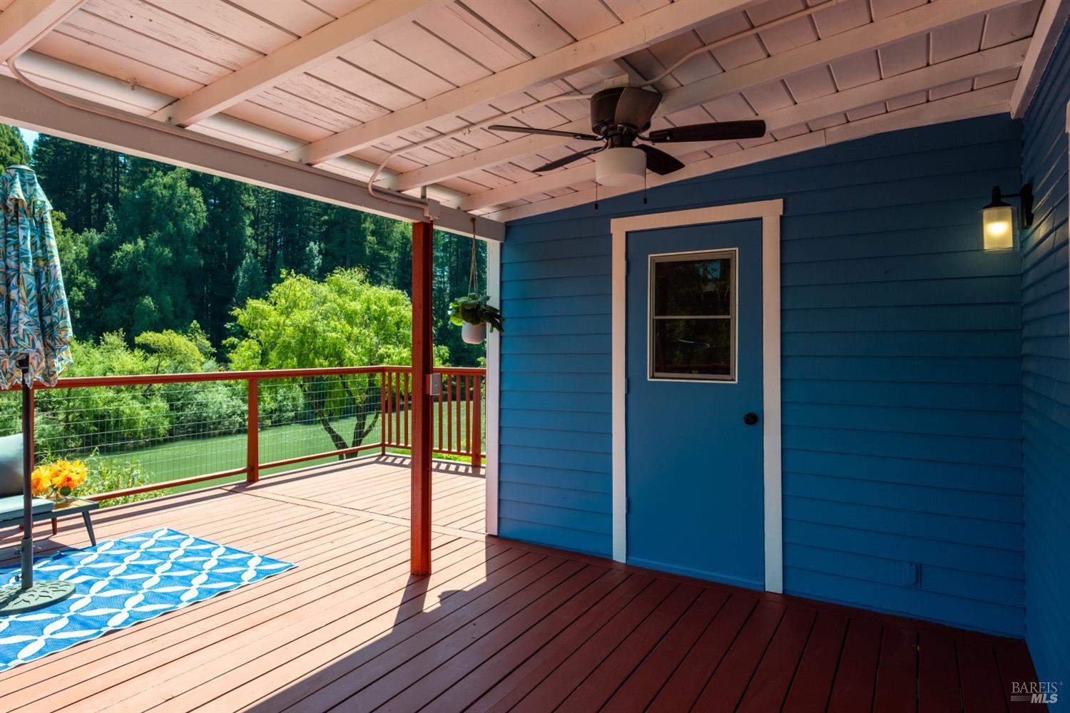 15627 Riverside Drive Guerneville, CA 95446 - Photo 23 of 41 a view of a balcony with wooden floor