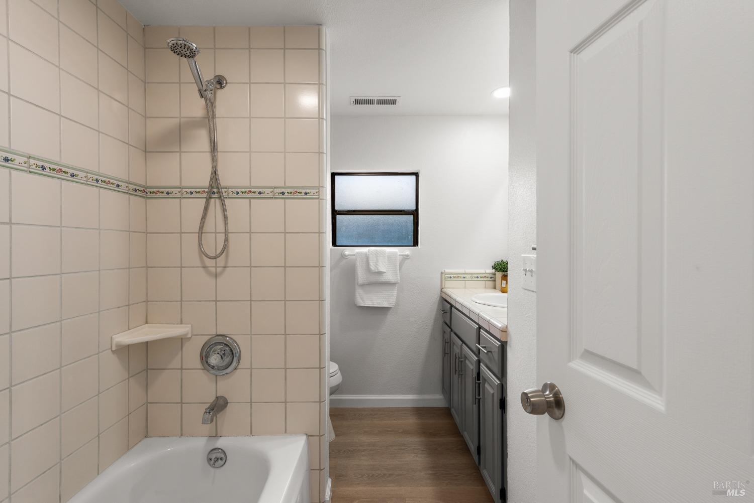 15627 Riverside Drive Guerneville, CA 95446 - Photo 27 of 41 a bathroom with a tub sink and toilet