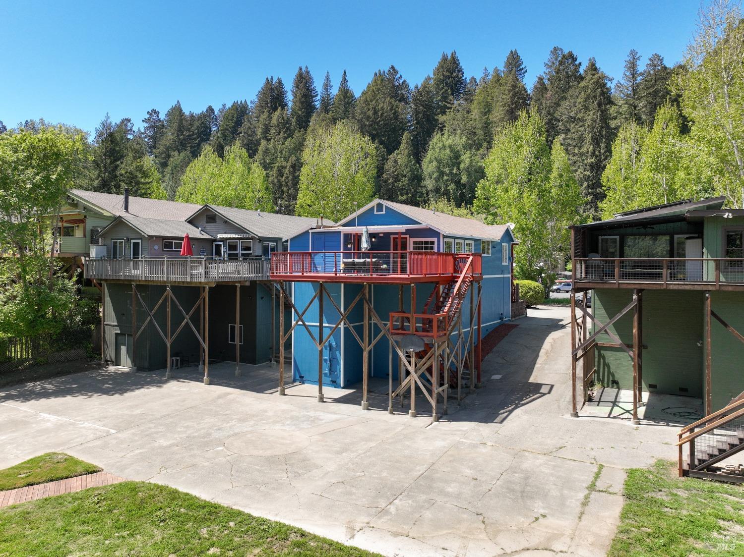 15627 Riverside Drive Guerneville, CA 95446 - Photo 32 of 41 a view of a chairs and table in the patio