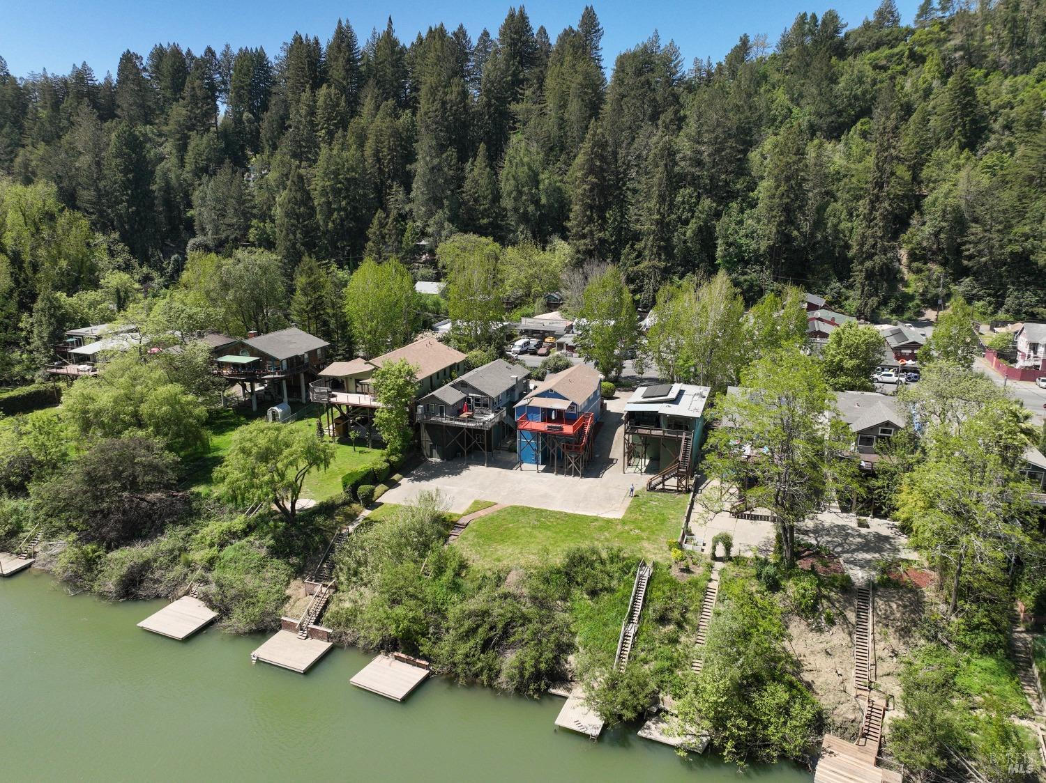 15627 Riverside Drive Guerneville, CA 95446 - Photo 37 of 41 a view of a backyard with plants and trees