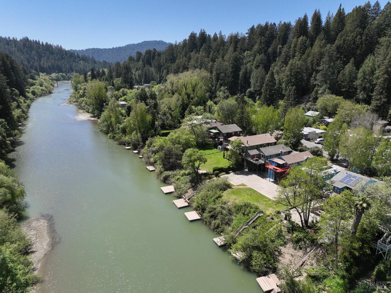 15627 Riverside Drive Guerneville, CA 95446 - Photo 38 of 41 an aerial view of a house with a yard and lake view