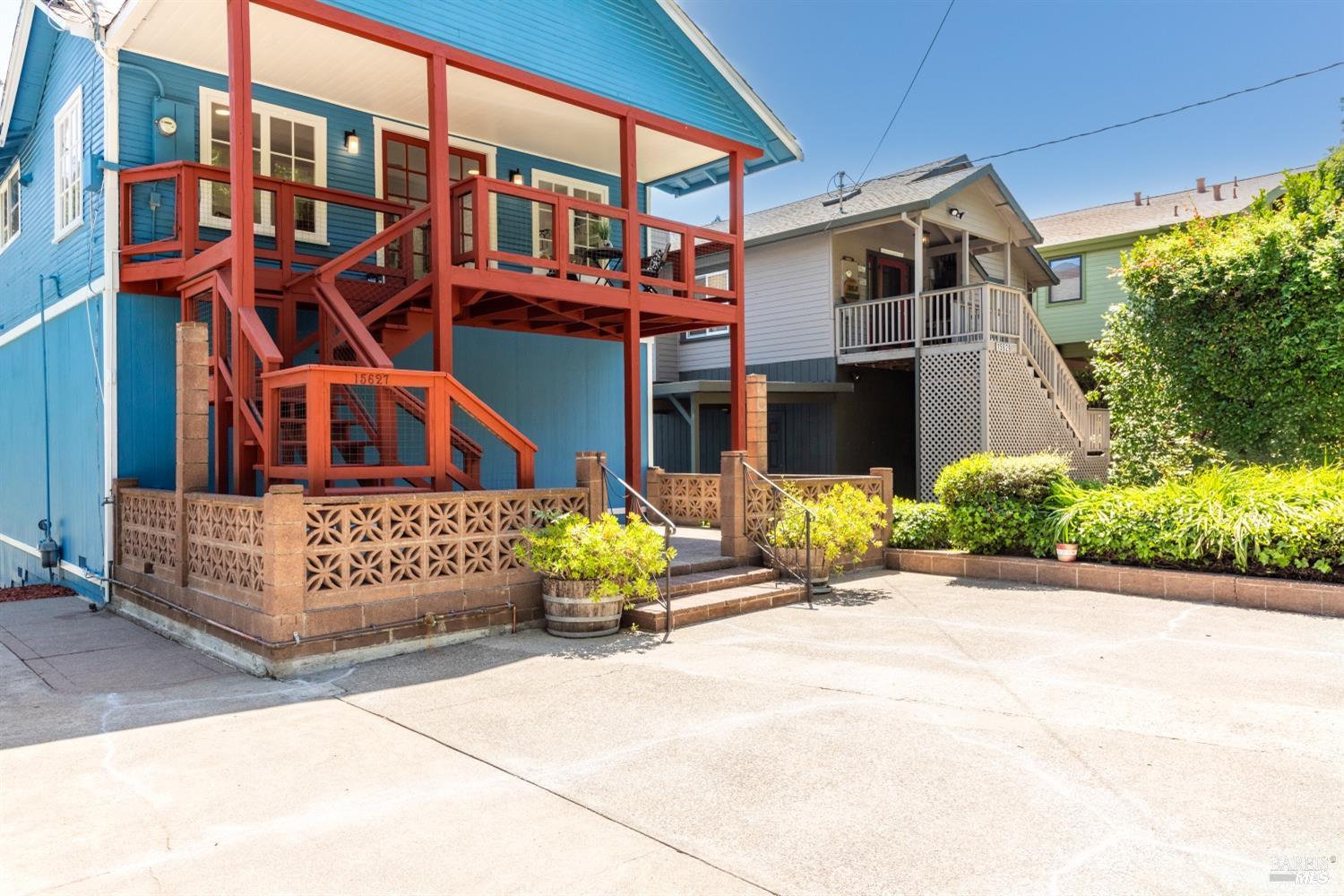 15627 Riverside Drive Guerneville, CA 95446 - Photo 4 of 41 a front view of a building with garden