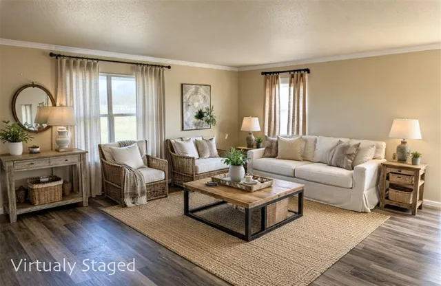 a living room with furniture and wooden floor