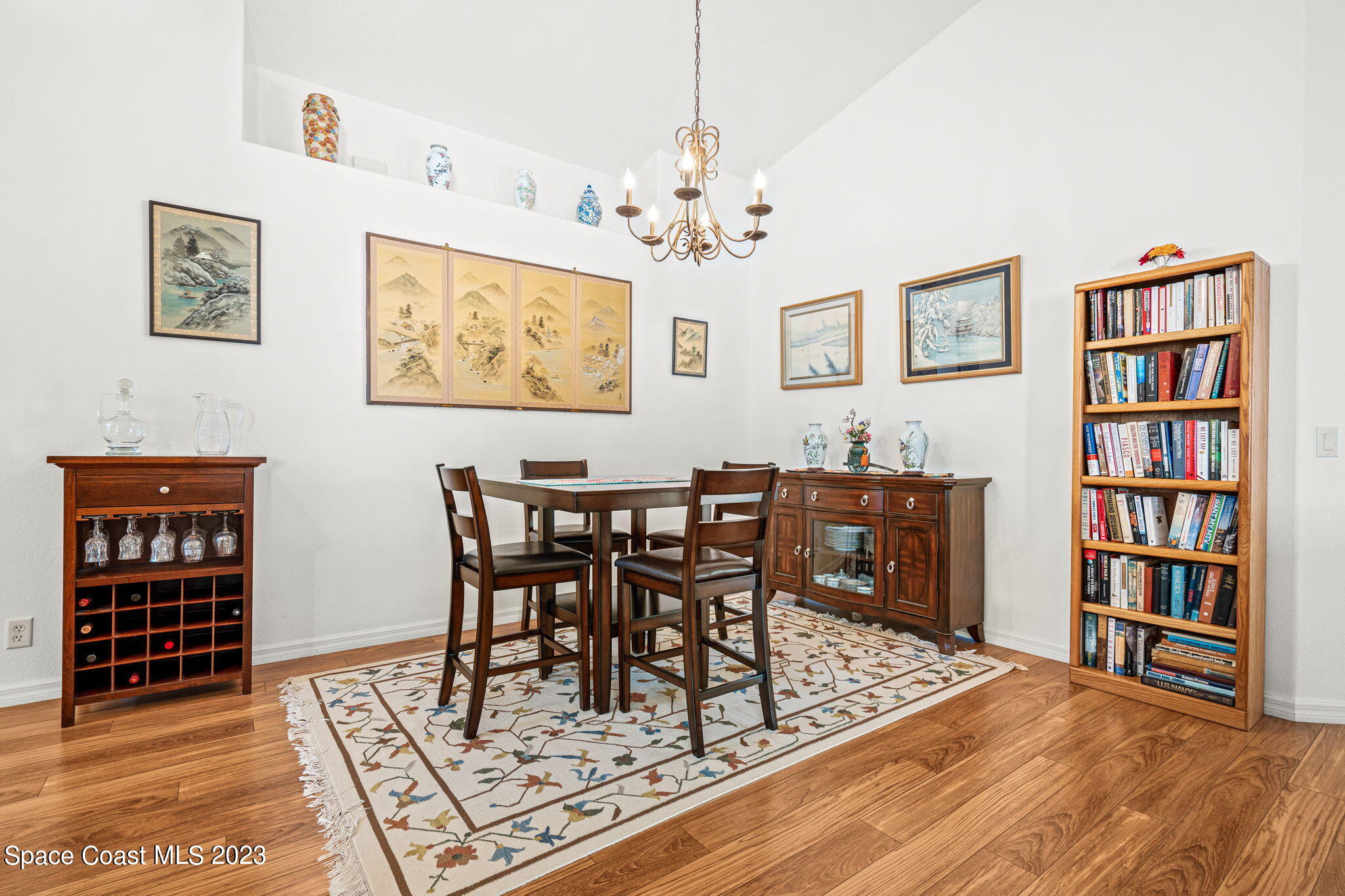 2463 Glasbern Circle Melbourne, FL 32904 - Photo 16 of 57 a view of a livingroom and dining room