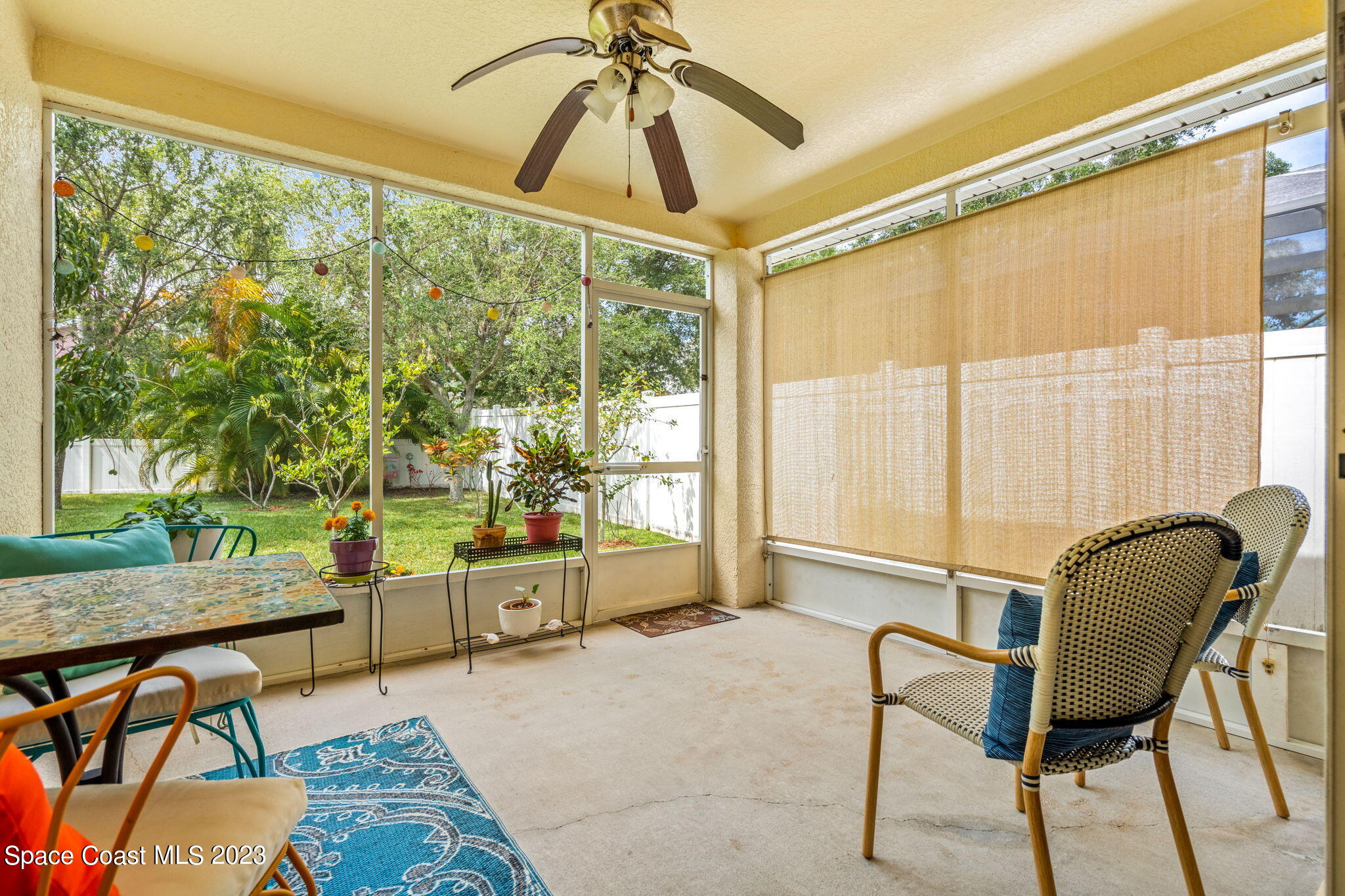 2463 Glasbern Circle Melbourne, FL 32904 - Photo 27 of 57 a living room with furniture and a window