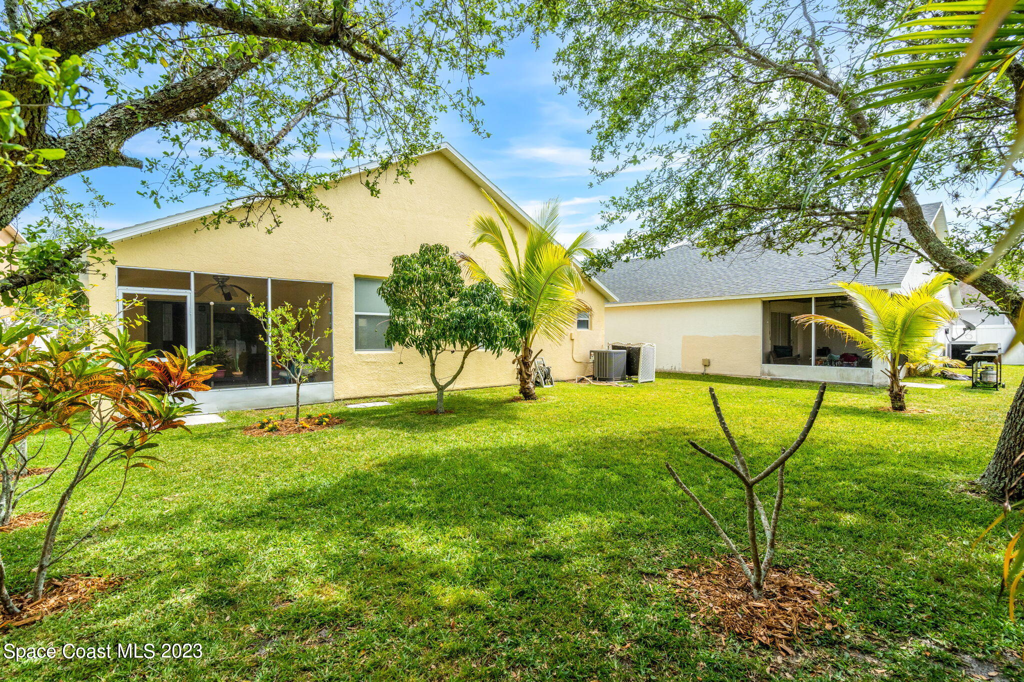 2463 Glasbern Circle Melbourne, FL 32904 - Photo 30 of 57 a view of a house with backyard