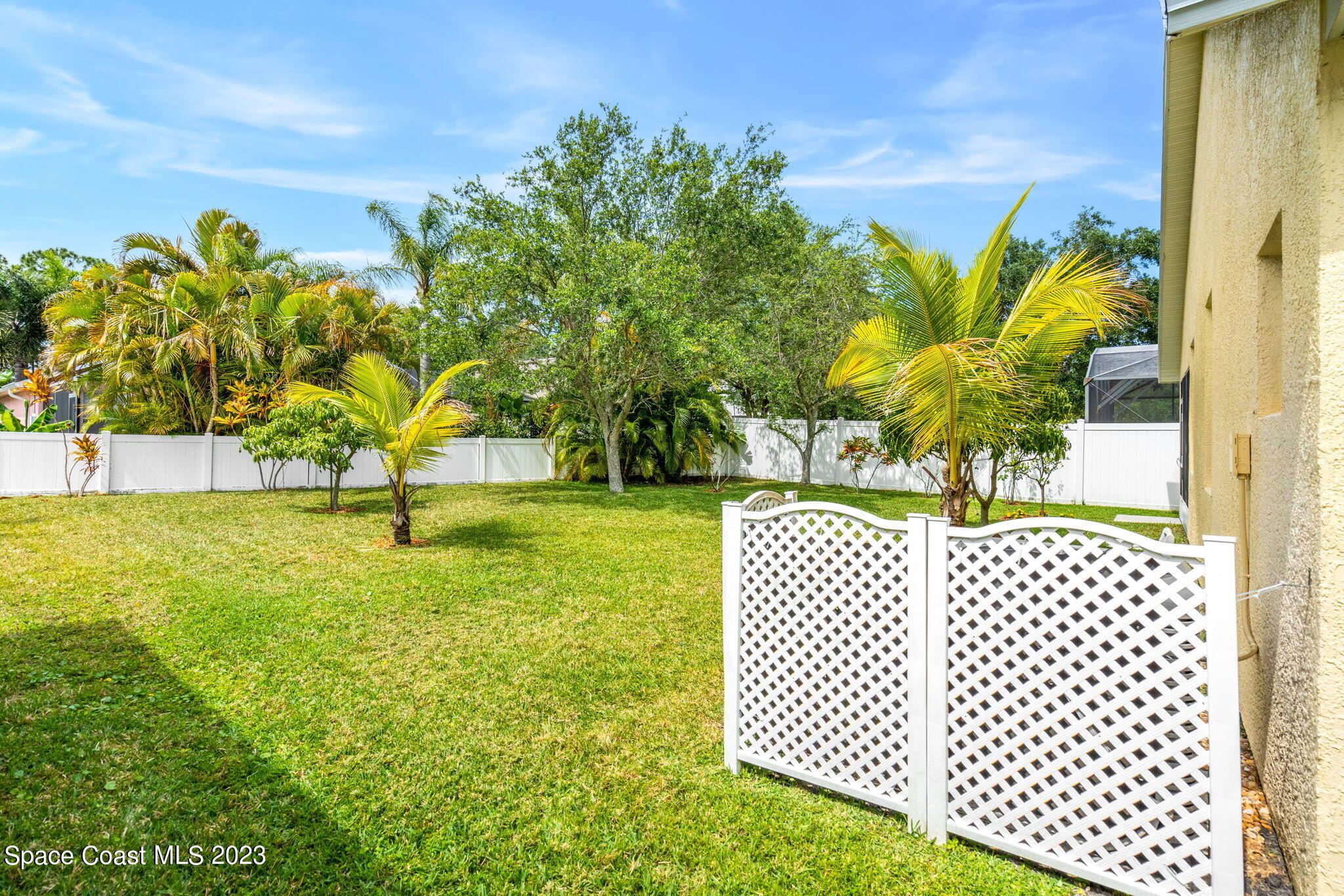 2463 Glasbern Circle Melbourne, FL 32904 - Photo 32 of 57 Backyard Views