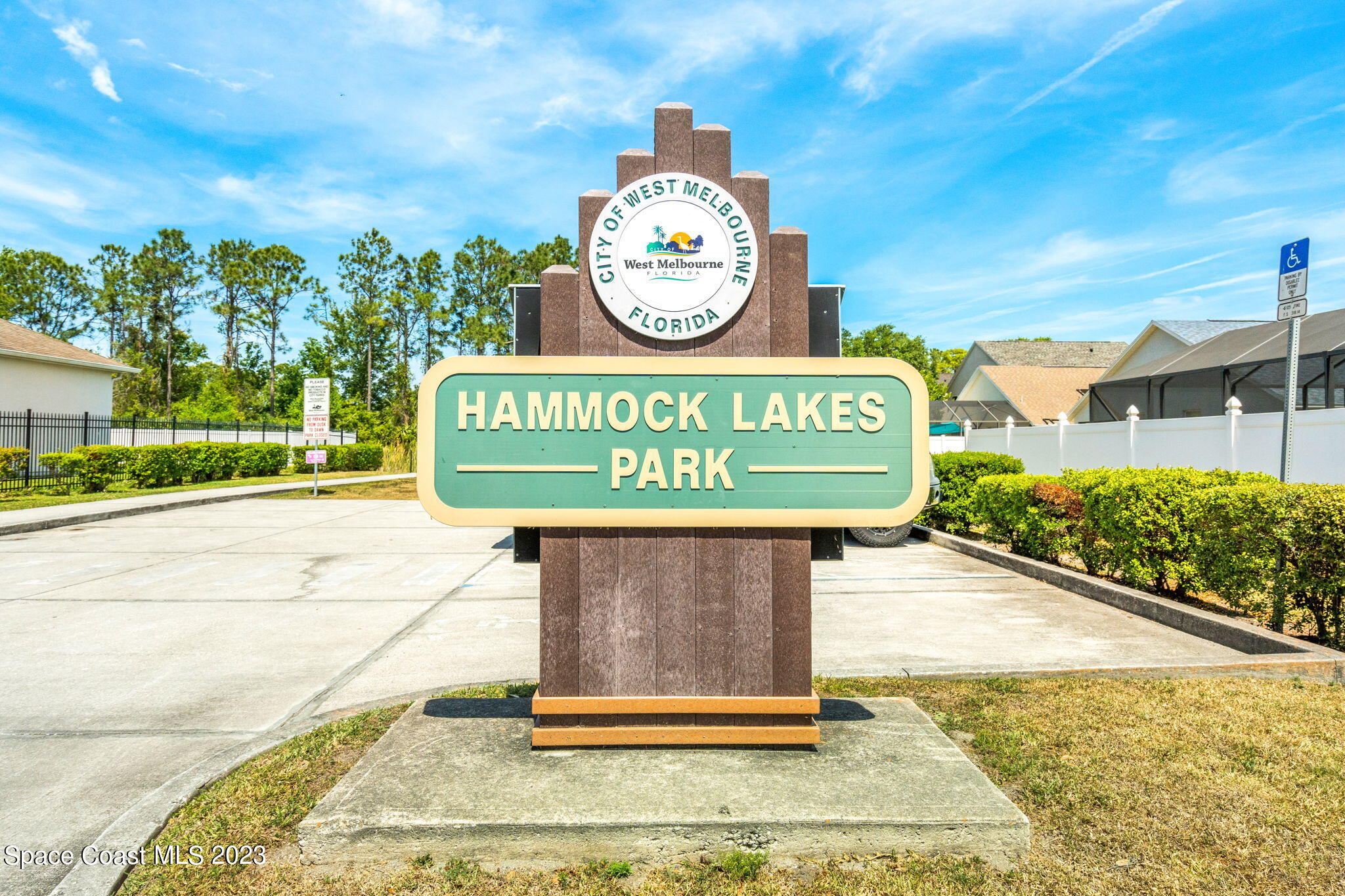 2463 Glasbern Circle Melbourne, FL 32904 - Photo 39 of 57 a sign on the side of a building