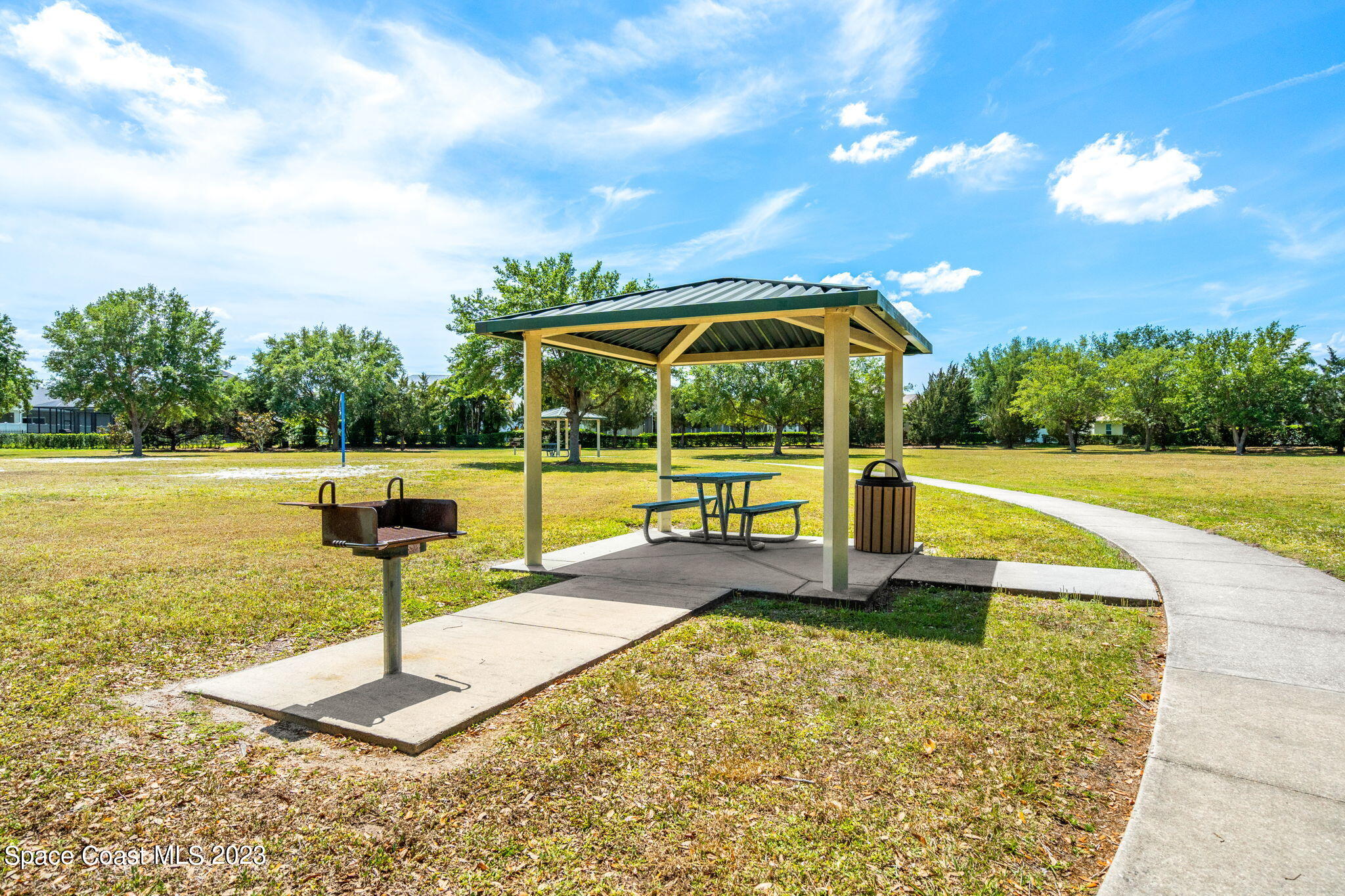 2463 Glasbern Circle Melbourne, FL 32904 - Photo 46 of 57 a view of a swimming pool with a patio