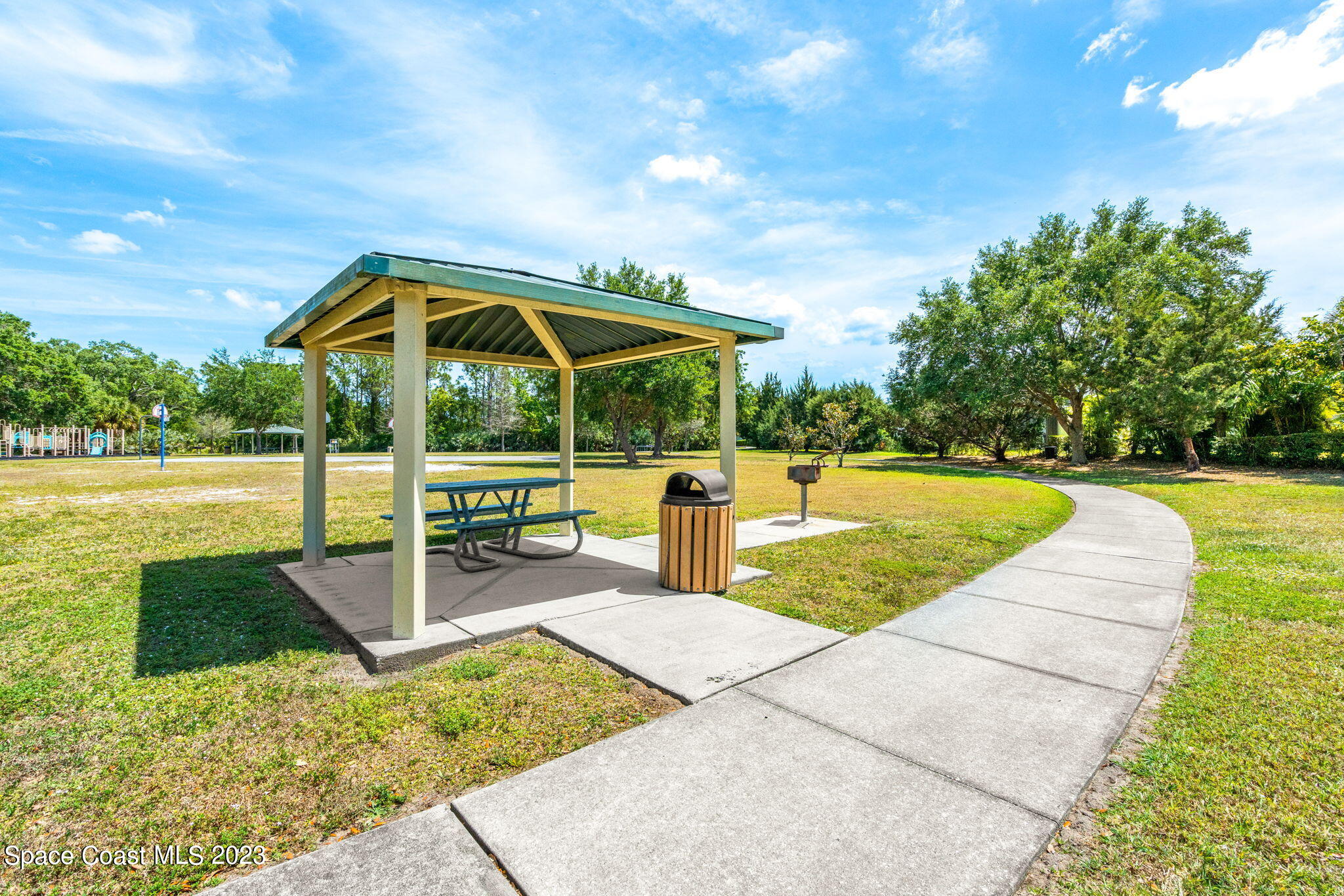 2463 Glasbern Circle Melbourne, FL 32904 - Photo 47 of 57 a view of a swimming pool with a patio