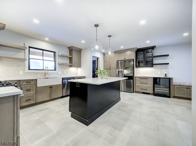 113 Cole Road Flemington, NJ 08822 - Photo 11 of 31 a kitchen with kitchen island granite countertop a sink cabinets and stainless steel appliances