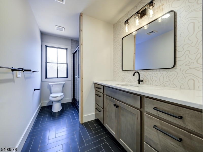 113 Cole Road Flemington, NJ 08822 - Photo 23 of 31 a bathroom with a sink mirror and toilet