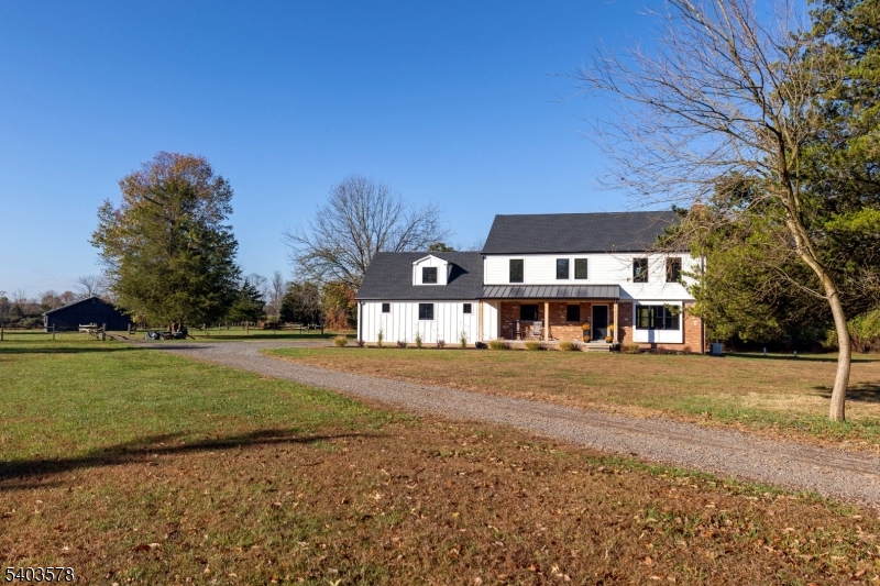 113 Cole Road Flemington, NJ 08822 - Photo 27 of 31 a front view of a house with a garden
