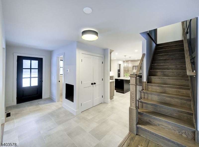 113 Cole Road Flemington, NJ 08822 - Photo 4 of 31 a view of a hallway with some storage and utility room