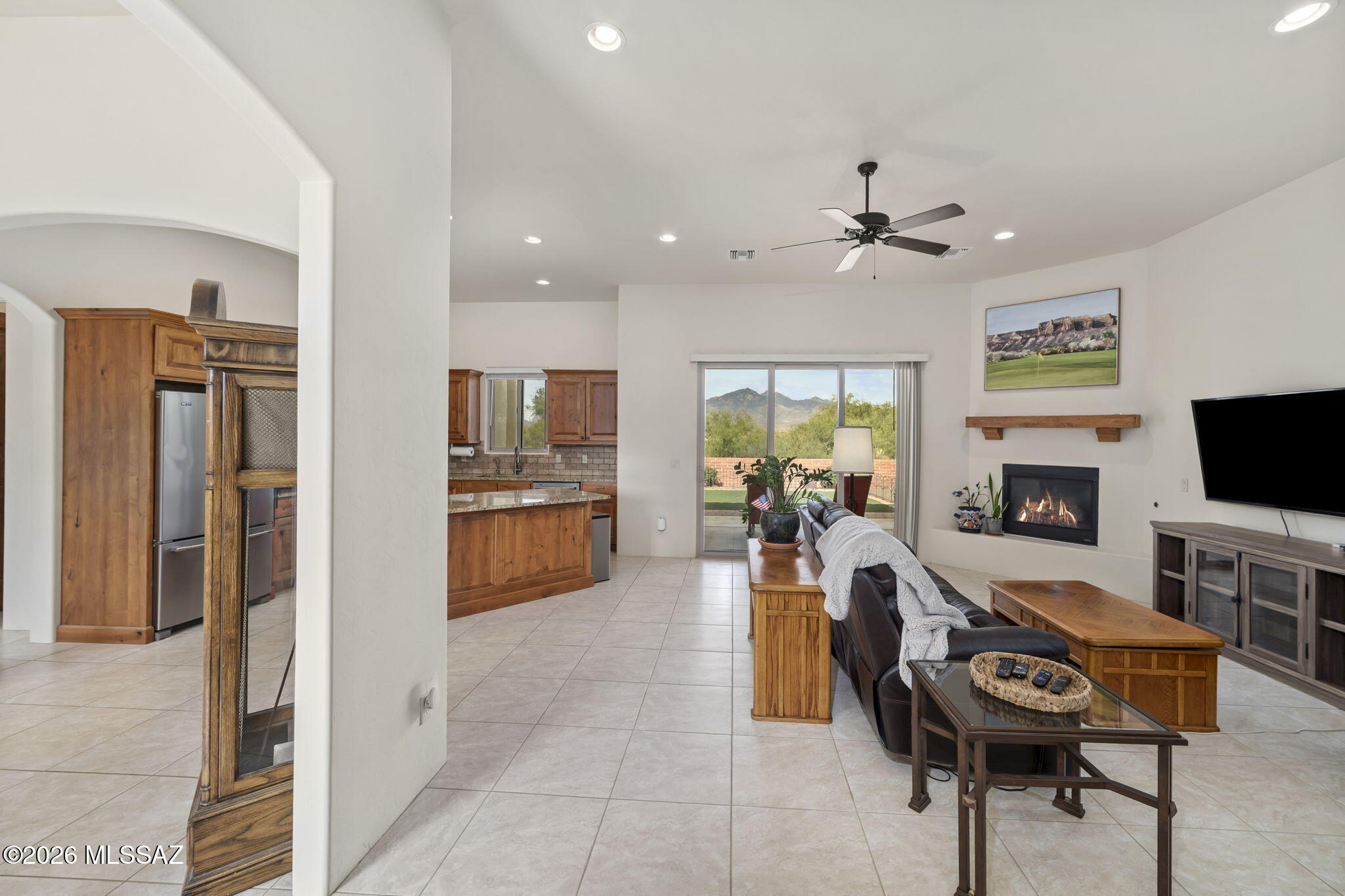 45 High View Court Tubac, AZ 85646 - Photo 11 of 44 a view of a kitchen with furniture and a fireplace