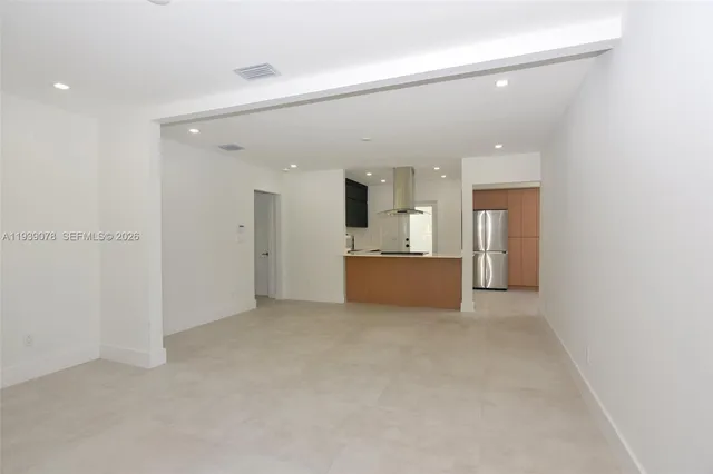 a view of kitchen and kitchen with sink