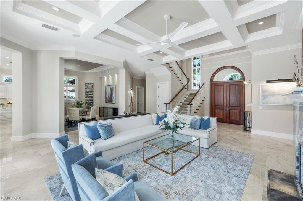 14459 Marsala Way Naples, FL 34109 - Photo 3 of 50 a living room filled with furniture