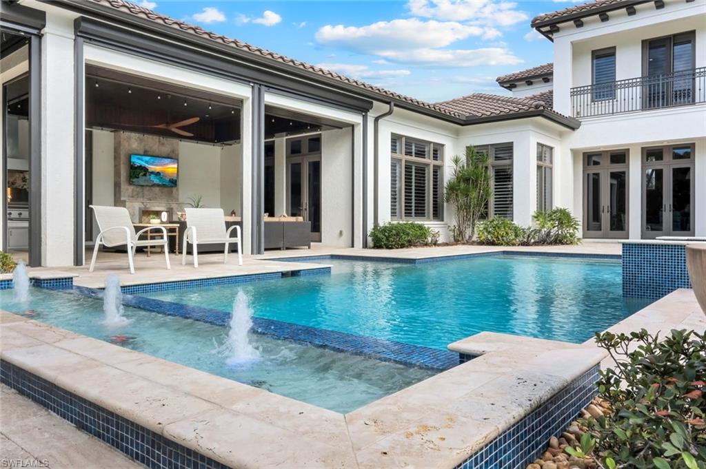 14459 Marsala Way Naples, FL 34109 - Photo 36 of 50 a view of a house with lake view