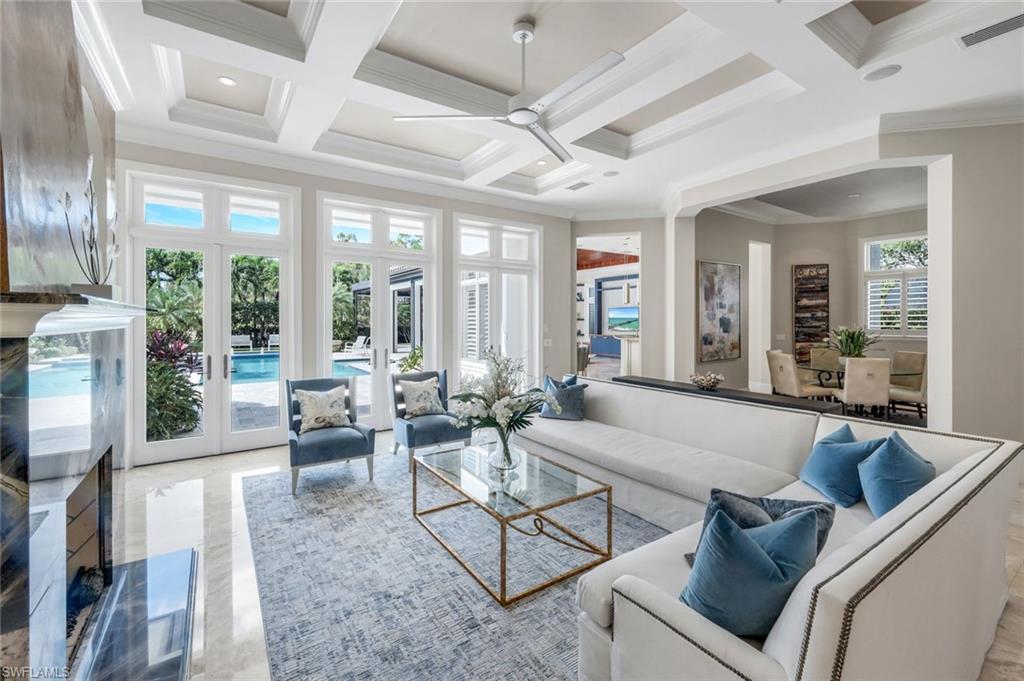 14459 Marsala Way Naples, FL 34109 - Photo 4 of 50 a living room with furniture and a large window