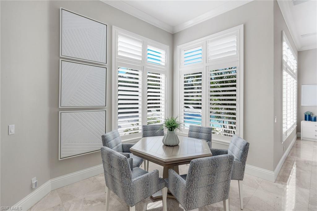 14459 Marsala Way Naples, FL 34109 - Photo 10 of 50 a dining room with furniture and window