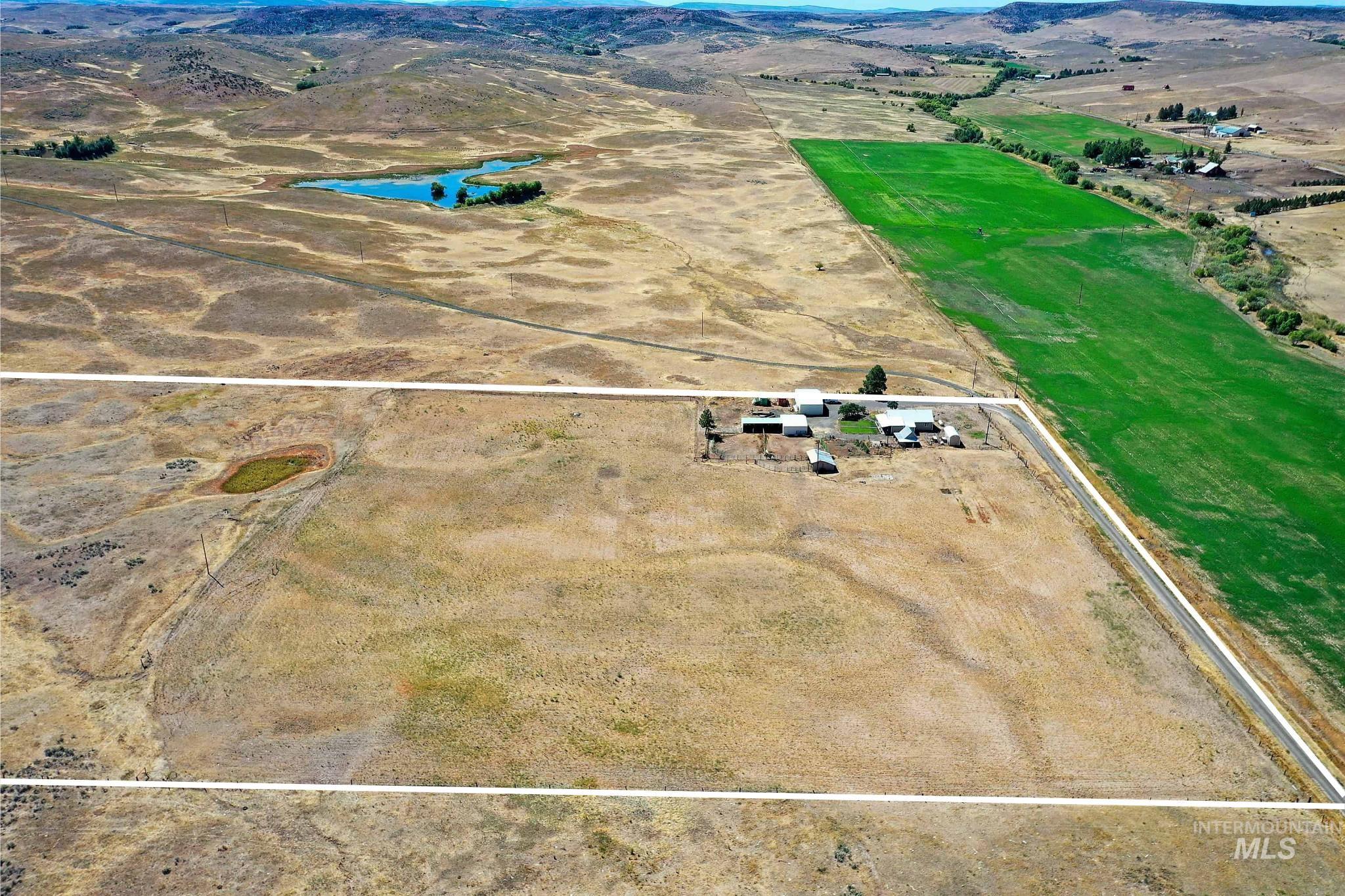 724 Mundy Gulch Road Indian Valley, ID 83632 - Photo 40 of 43 Aerial view of sparsely populated area with property parcel outlined