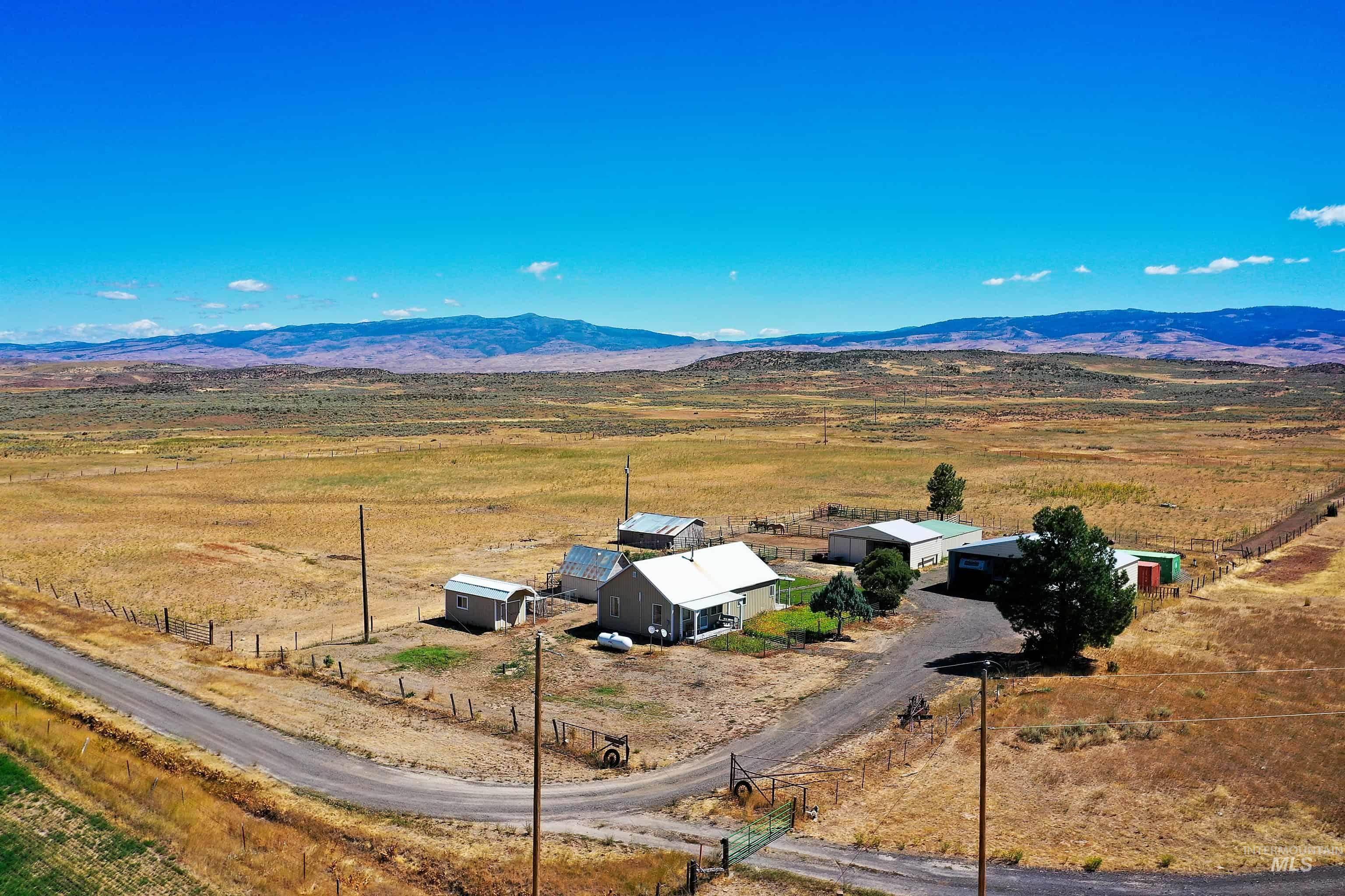 724 Mundy Gulch Road Indian Valley, ID 83632 - Photo 41 of 43 Overview of rural landscape featuring a mountain backdrop