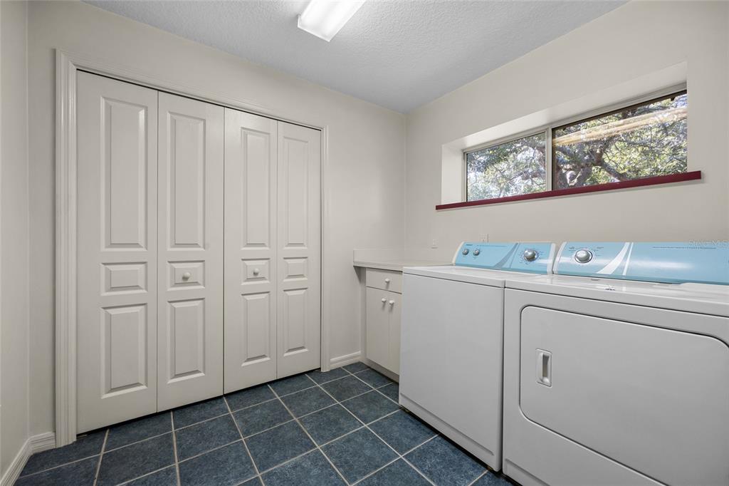 3951 Myrtle Street St. Augustine, FL 32084 - Photo 11 of 23 a view of cabinets with window