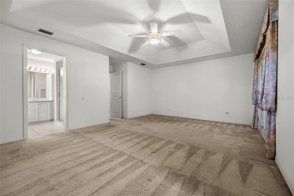 3951 Myrtle Street St. Augustine, FL 32084 - Photo 16 of 23 a view of an empty room with a ceiling fan