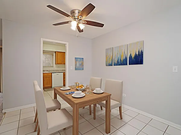 a view of a dining room with furniture