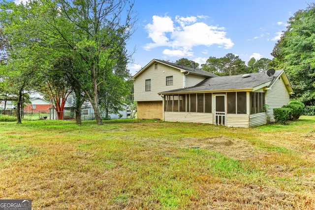 a house view with a garden space