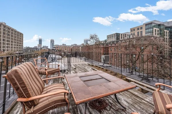 a view of a terrace with sitting area