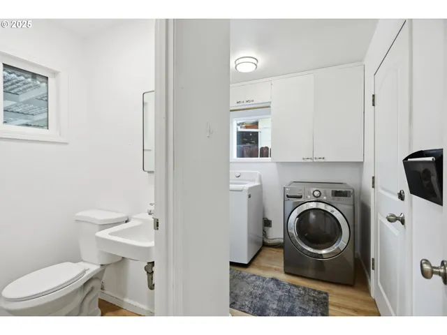 a bathroom with a toilet and a sink