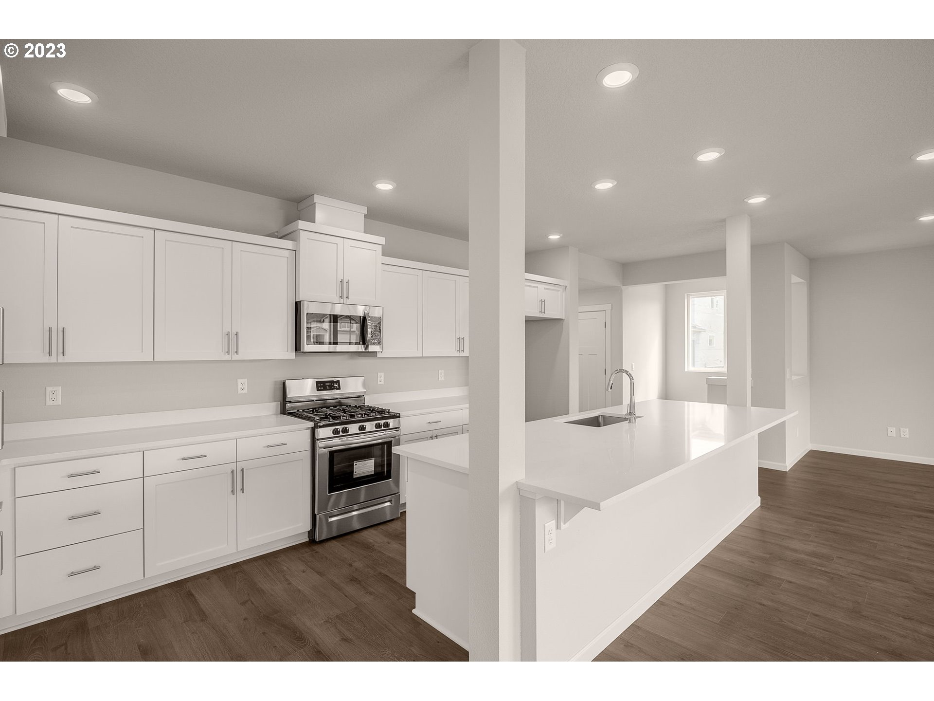 6072 Southeast 24th Street Gresham, OR 97080 - Photo 15 of 37 a kitchen with refrigerator and cabinets