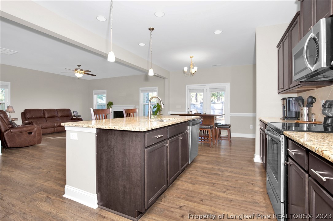 101 Carousel Street West End, NC 27376 - Photo 16 of 50 a kitchen with lots of counter top space