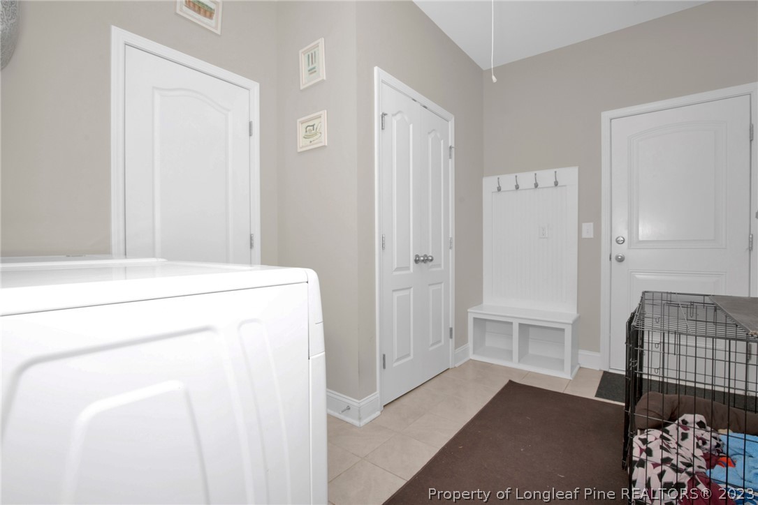101 Carousel Street West End, NC 27376 - Photo 17 of 50 a utility room with dryer and washer