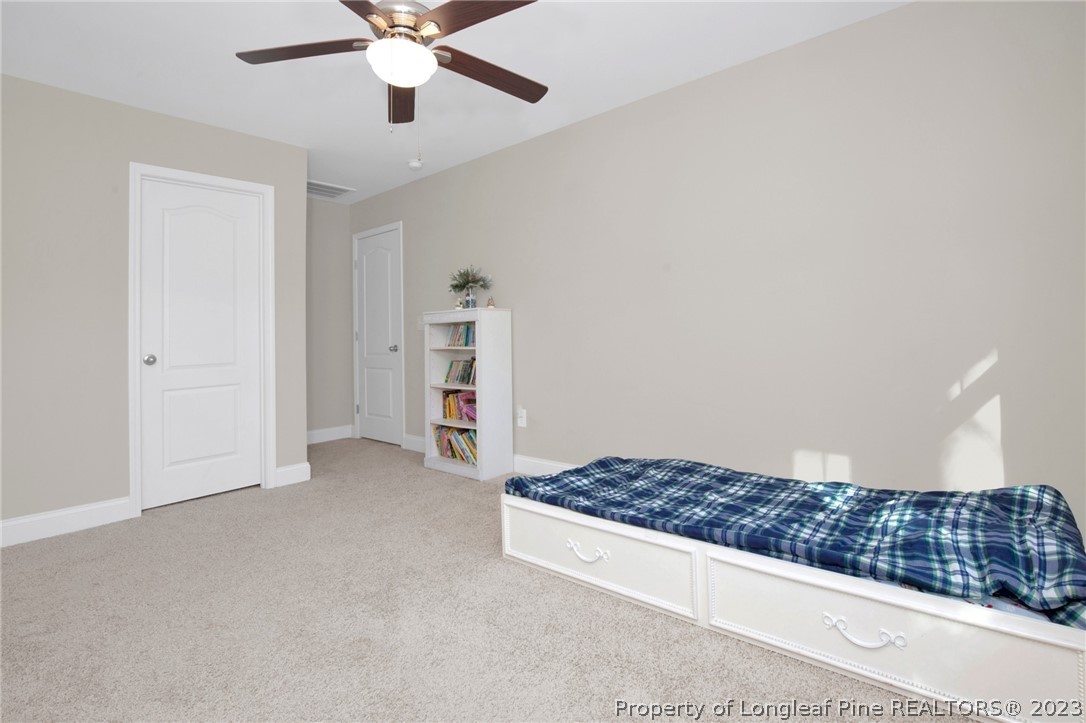 101 Carousel Street West End, NC 27376 - Photo 19 of 50 a living room with closet