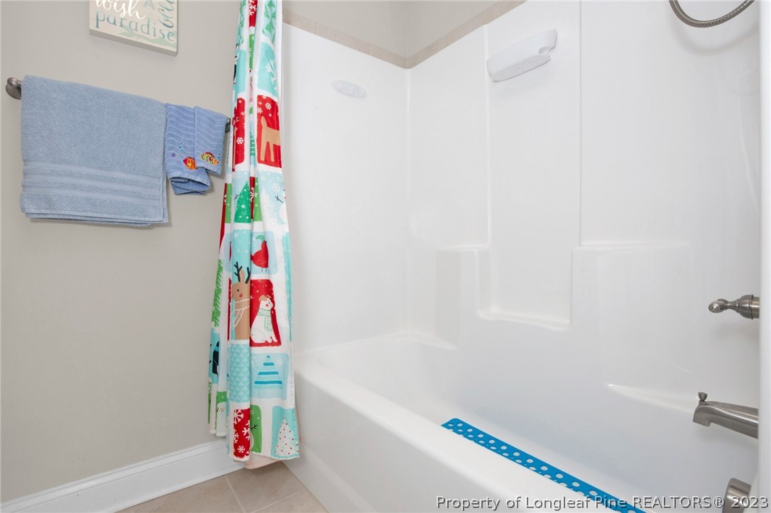101 Carousel Street West End, NC 27376 - Photo 23 of 50 a room with a small space and tub
